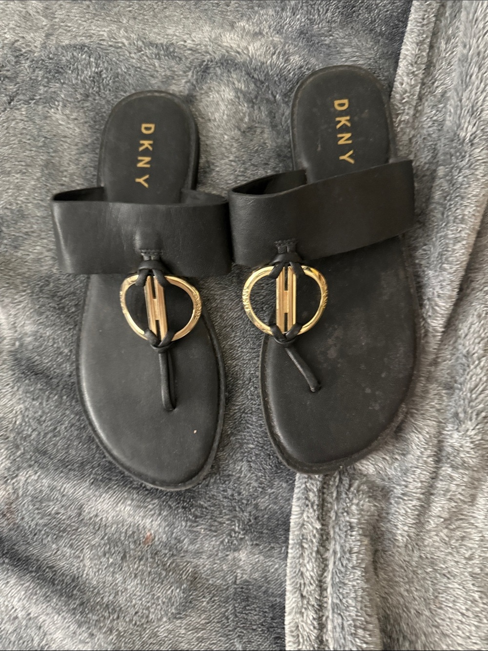 DKNY Black Leather Toe-Post Sandals with Gold Ring Detail
